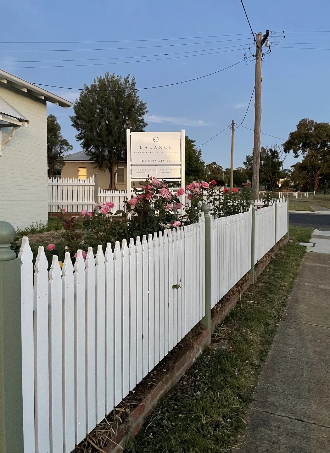 Balance Physiotherapy and Pilates sign beside the clinic garden